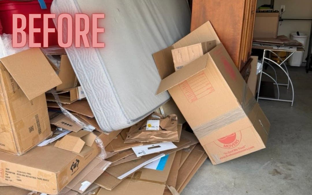 Before: a garage full of cardboard boxes and a mattress