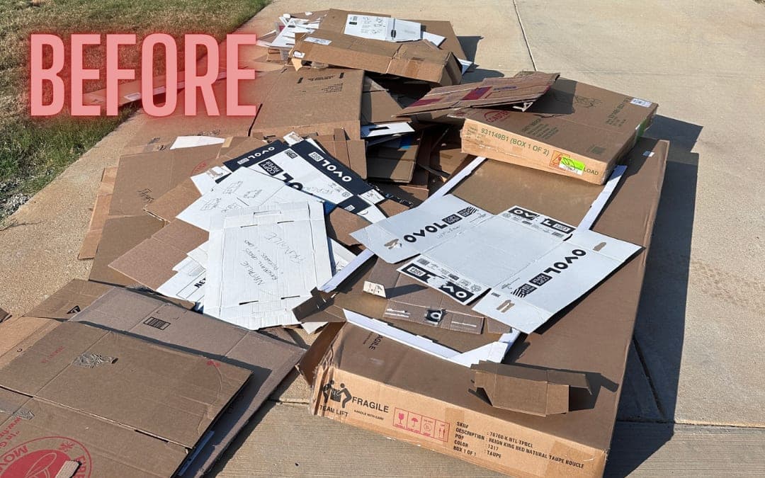Before: flattened cardboard piled on a driveway