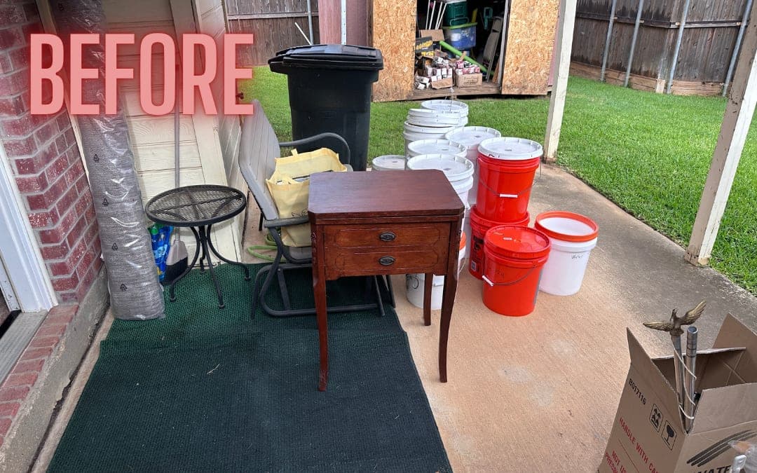 Before: a covered patio with a table, buckets and bins
