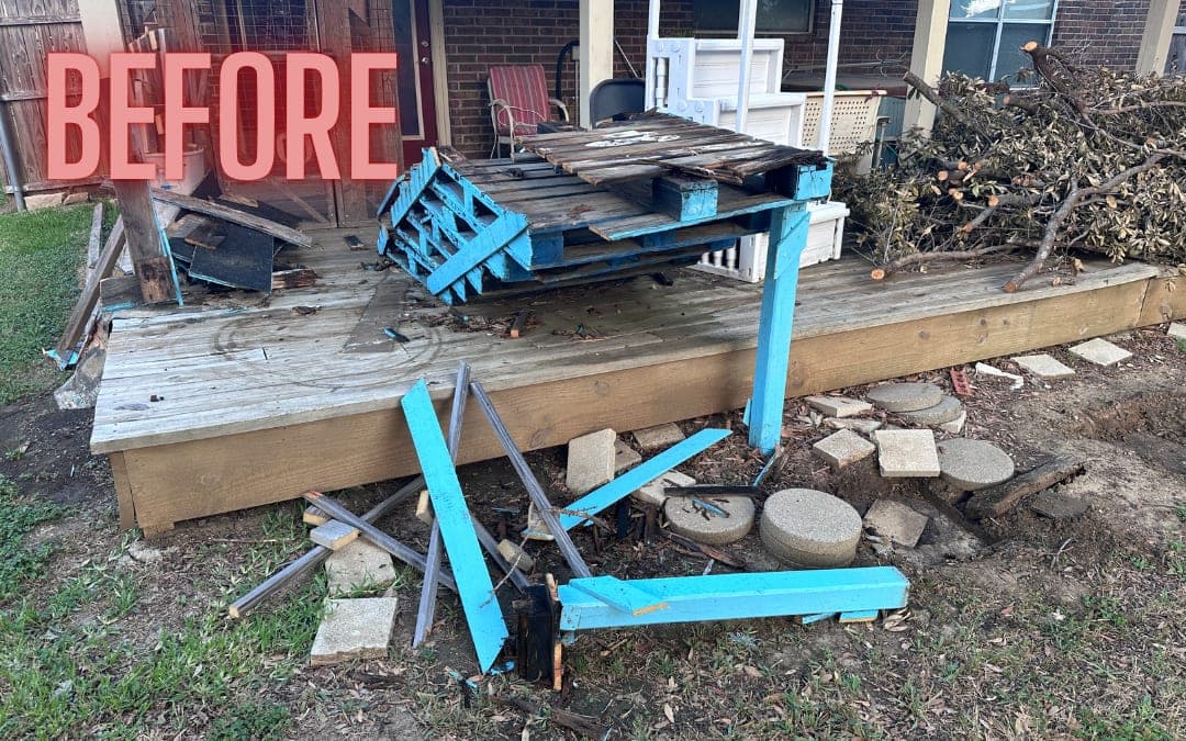 Before: pallets, boards and branches on a backyard deck