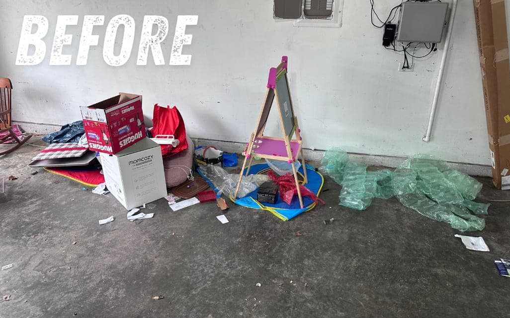 Before: toys and clutter on a garage floor