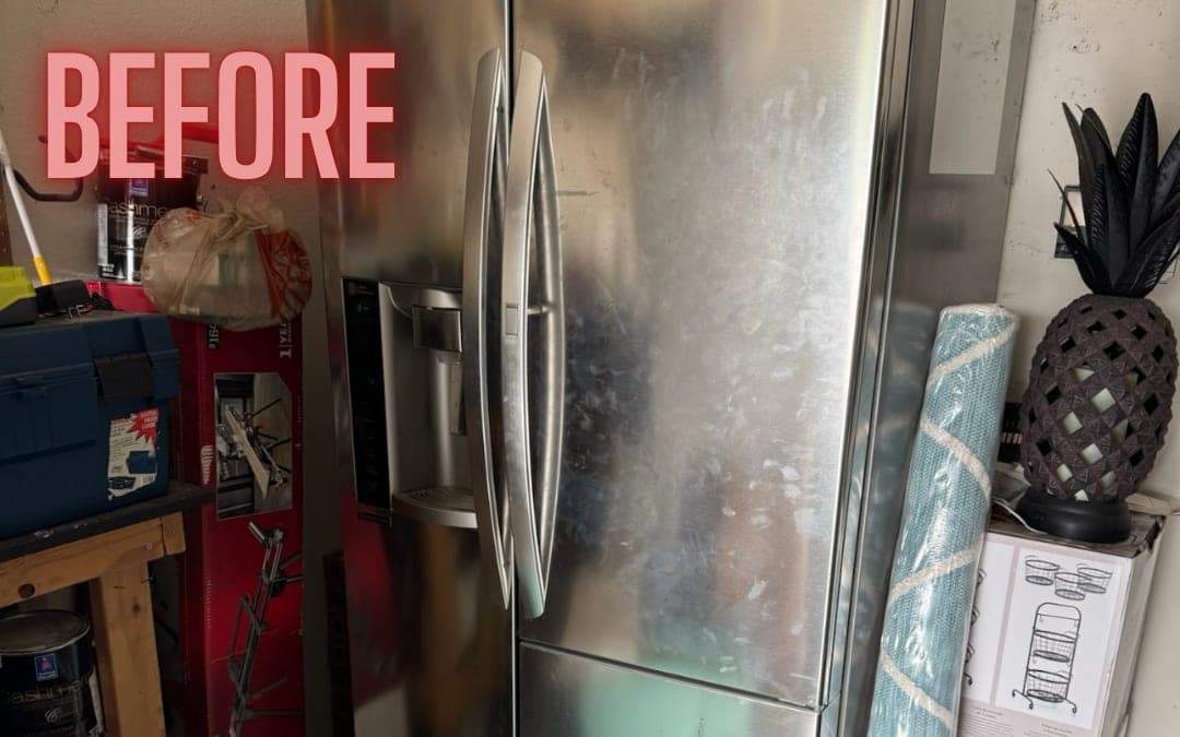 Before: a stainless refrigerator in a garage